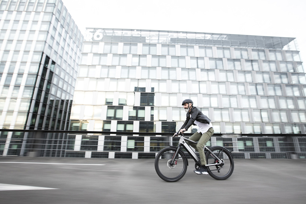 A cyclist riding Stromer St5 ABS on the road