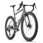 BMC Kaius 01 TWO Copper Grey, front three-quarter view with ICS Carbon Aero one-piece cockpit and 45 mm gravel tyres