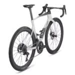 Rear three-quarter view of the BMC Teammachine R 01 showing the Dura-Ace Di2 drivetrain, deep-section carbon wheels and all-aero seatpost
