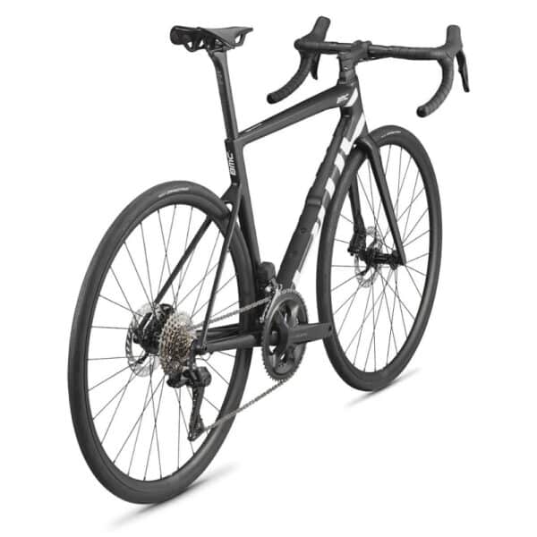 Rear three-quarter view of the black BMC Teammachine SLR TWO road bike