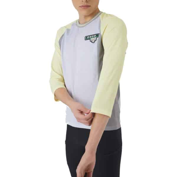 Close-up of the relaxed three-quarter raglan sleeve and contrast panel on the Barbara V2 jersey