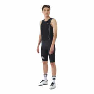 Male cyclist wearing the black Cafe du Cycliste Cecile bib short, front view showing the performance fit