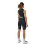 Rear view of the Cafe du Cycliste Cecile women’s bib short showing the mesh bib straps and reflective detail
