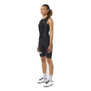 Female cyclist wearing the black Cafe du Cycliste Cecile bib short, front view showing the performance fit