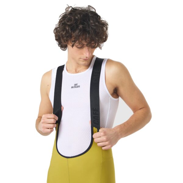 Close-up of the lightweight bib straps and mesh upper on the Cafe du Cycliste Eva V2 bib short