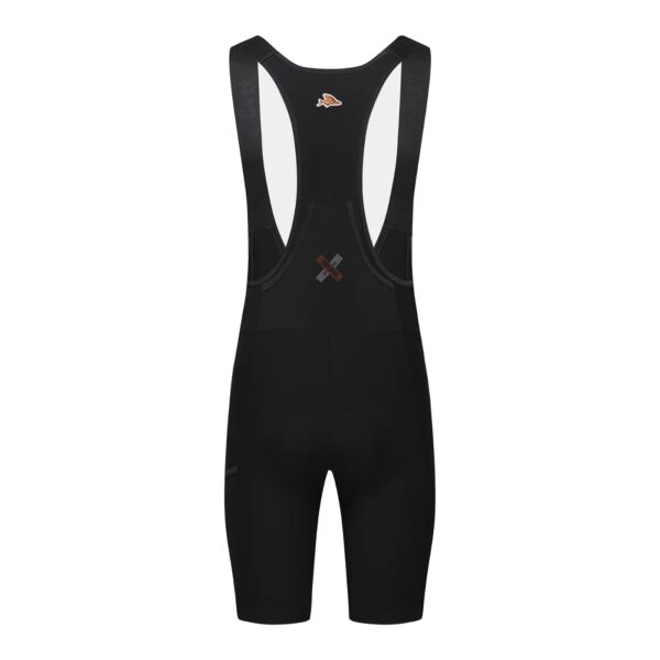 Back of the Cafe du Cycliste Eva V2 cargo bib short showing the ventilated mesh back panel