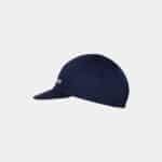 Side profile of the Cafe du Cycliste Gapette cap in Navy showing the short peak