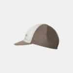 Side profile of the Cafe du Cycliste Gapette cap showing the short peak and elasticated back