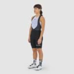 Cyclist wearing the Cafe du Cycliste Graziella bib shorts in Black, front view
