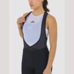 Back detail of the Cafe du Cycliste Graziella bib shorts showing the drop-tail release design