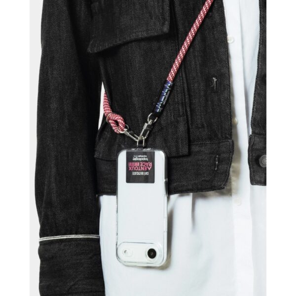 Close-up of the quick-release swivel carabiner on the Topologie 8mm rope strap clipped to a phone case