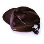 Dérive DRFT Five Panel Cap in Midnight Black ripstop nylon, rear three-quarter view with _Dérive print, side vent and rear buckle