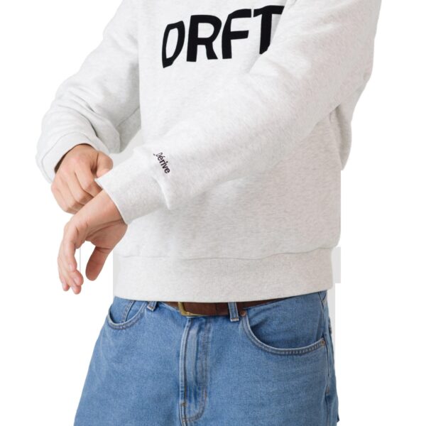 Dérive DRFT light grey cotton sweatshirt, sleeve and ribbed cuff detail with the _Dérive cuff print and the DRFT chest logo