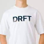 Dérive DRFT white T-shirt close-up of the DRFT chest print, crew neck and dropped shoulder