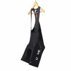 Dérive Volume women’s cycling bib shorts in Black, front view with laser-cut straps