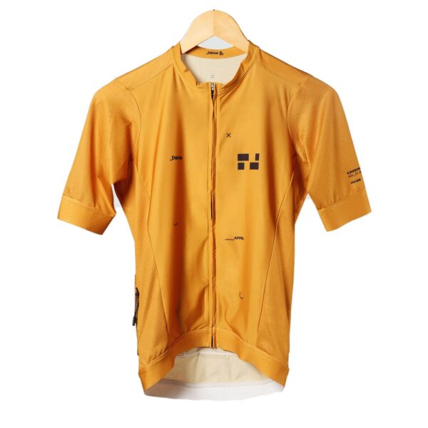Dérive Volume women’s short sleeve cycling jersey in gold, front view