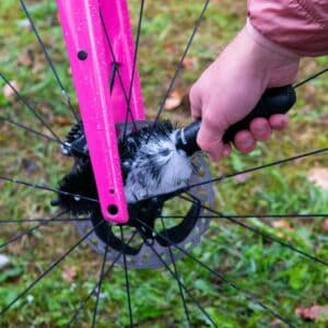 Dynamic Cone Brush cleaning the rear wheel hub and disc rotor area