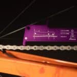 Dynamic Double Checker three-point chain wear indicator seated in a bike chain