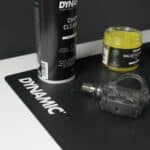 Dynamic Mat Max used as a tool mat with a pedal, grease and chain cleaner on it