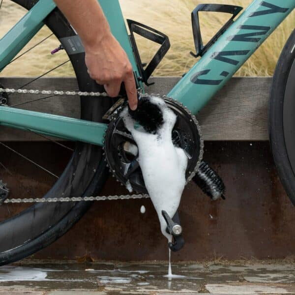 Dynamic So Long Brush scrubbing foam around the chainrings and crank