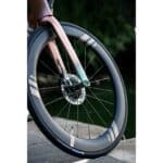 Farsports EVO C5 carbon front wheel fitted in a road fork with a centre-lock disc rotor