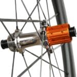 Close-up of the Farsports EVO S ratchet rear hub and orange Shimano HG freehub body