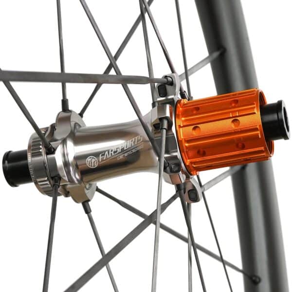 Close-up of the Farsports EVO S ratchet rear hub and orange Shimano HG freehub body