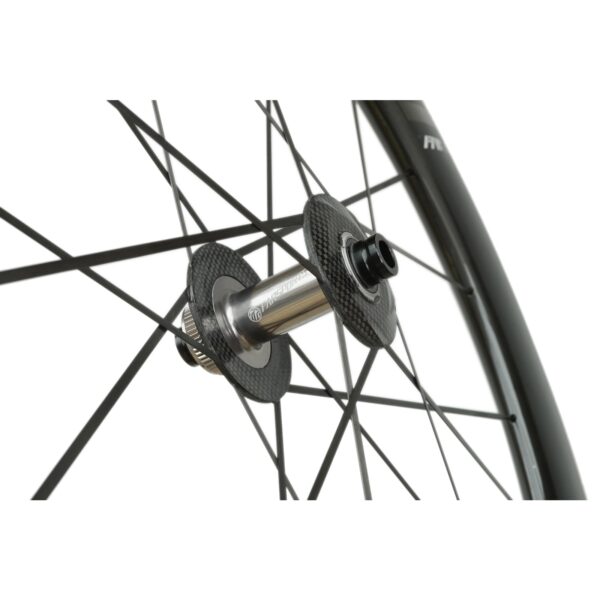Close-up of the Farsports Ultimate EVO S5 front hub showing the one-piece carbon spokes moulded into the hub flange