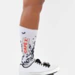 Café du Cycliste Aero Socks Pain worn with white cycling shoes