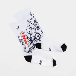 Pair of Café du Cycliste Aero Socks in the Pain print, flat lay