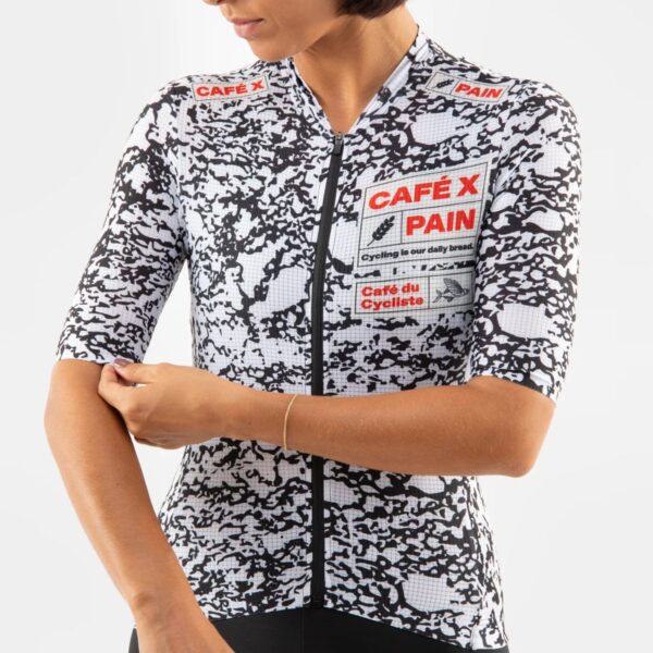 Close-up of the Angeline Pain jersey sleeve and front zip
