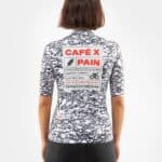Woman wearing the Café du Cycliste Angeline Pain jersey, back view