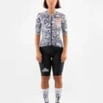 Woman wearing the Café du Cycliste Angeline Pain jersey, front view