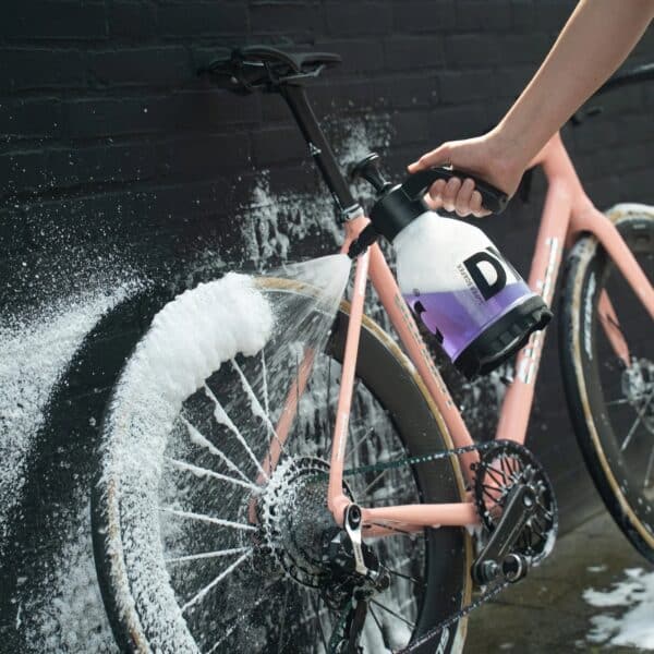 Dynamic Super Soap foam covering the rear wheel and drivetrain of a road bike