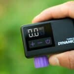 Dynamic Turblo held in the hand, showing the pressure display and buttons