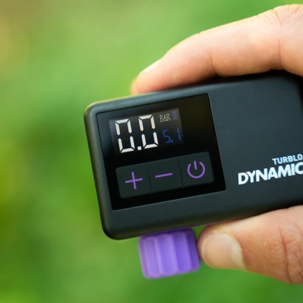 Dynamic Turblo held in the hand, showing the pressure display and buttons
