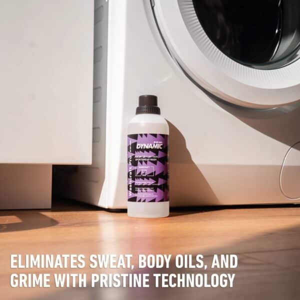 Dynamic Washcraft Pro next to a washing machine: eliminates sweat, body oils and grime with Pristine Technology