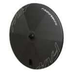 Farsports UFO full disc carbon rear wheel, three-quarter view showing the faceted disc surface and valve access hole