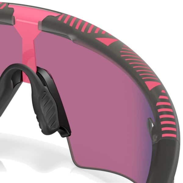 Close-up of the pink Giro d'Italia frame pattern and Unobtainium nosepad on the Oakley Sphaera Slash
