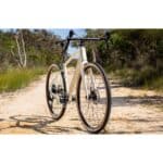 Polygon Tambora G4 in White, front three-quarter view on a gravel track (model photo)