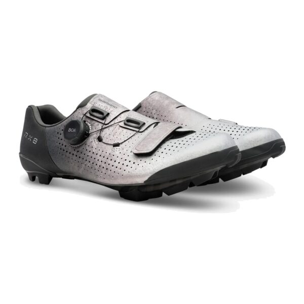 Pair of Shimano SH-RX801 gravel shoes in silver, three-quarter view