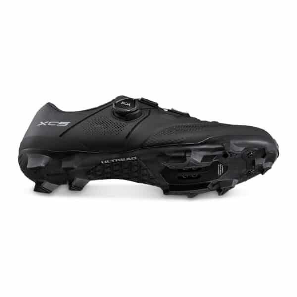 Shimano SH-XC503 shoe from the rear three-quarter, ULTREAD outsole and low-profile midsole