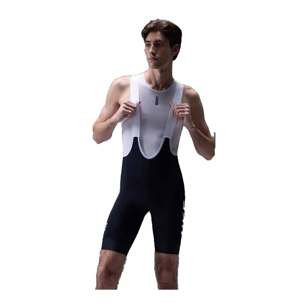 UKE RP400 men's bib shorts in black with white mesh upper, worn by a model, front view