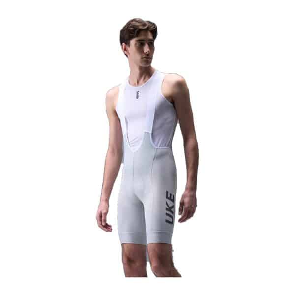 UKE RP400 men's bib shorts in Haze Ash light grey, worn by a model, front view