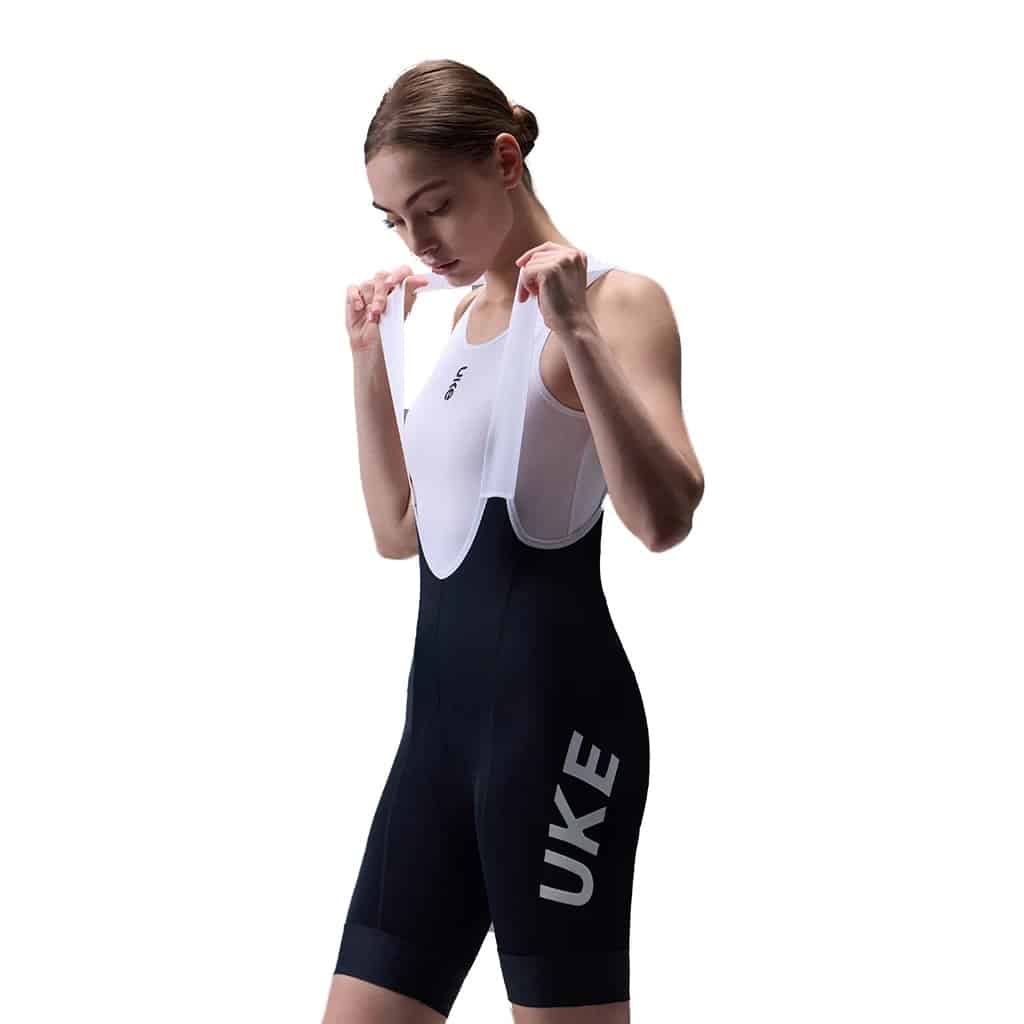 UKE RP400 women’s road bib shorts in Black with EIT pad, front view on model