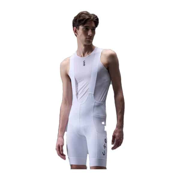 UKE RPC400 men's cargo bib shorts in white, worn by a model, front view with the thigh storage pocket