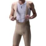 UKE RS200 bib shorts in Grayish Brown, front close-up of the pad area and straps